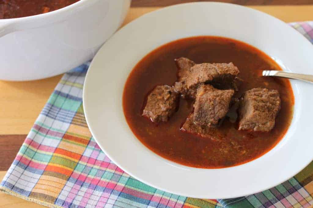 Bowl of beef chunks in red Chile sauce 