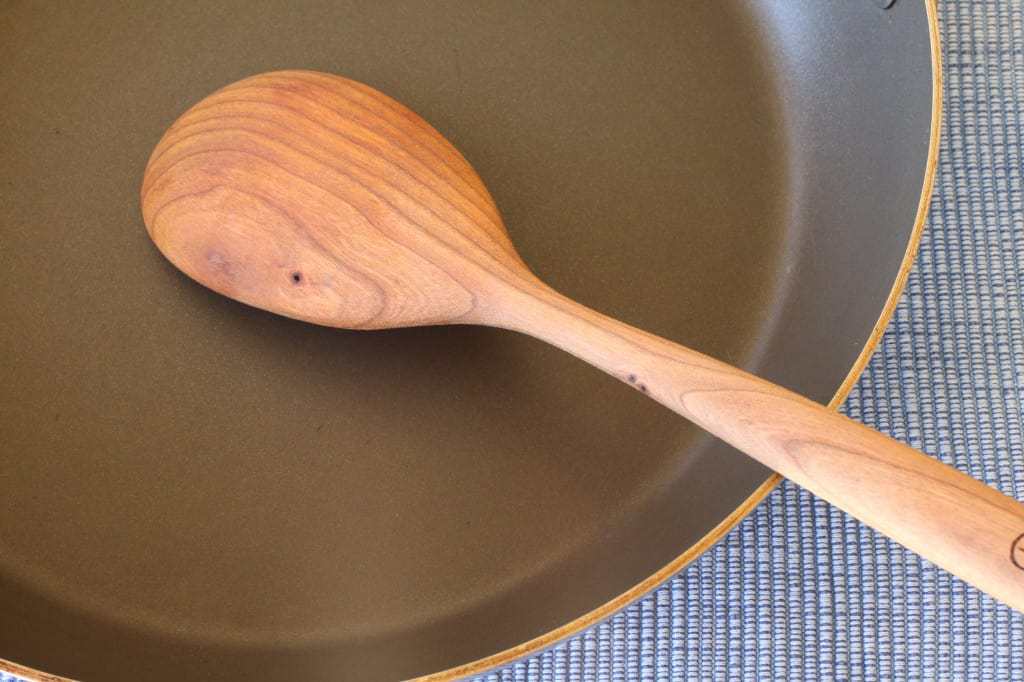 non-stick pan with wooden spoon