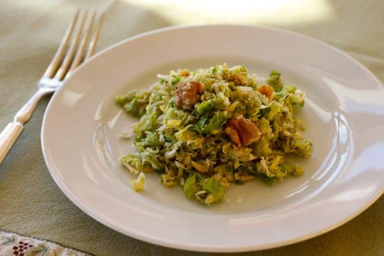 Brussels Sprouts Slaw | For a super-quick slaw, shred Brussels sprouts, toss with vinaigrette, sprinkle walnuts and cheese. www.LiveBest.info