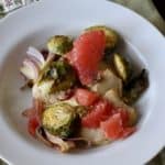 Chicken with Brussels Sprouts and Grapefruit in bowl with fork