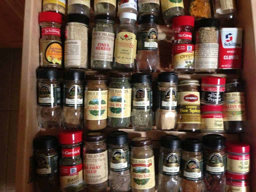 spice drawer filled with spice jars