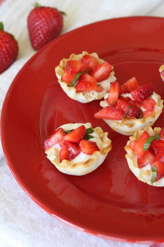 Strawberry Basil Tarts on a red plate