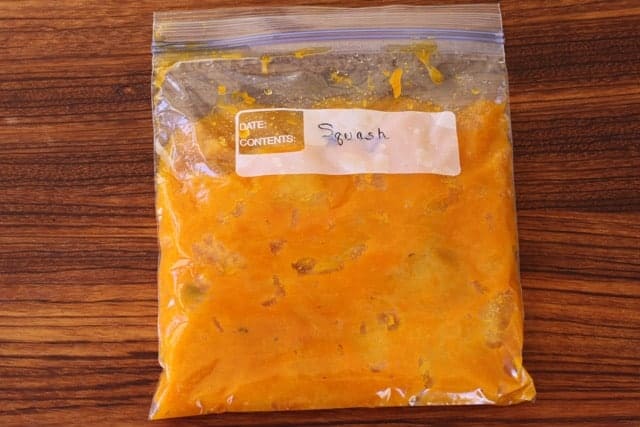 frozen squash labeled in a zip top freezer bag