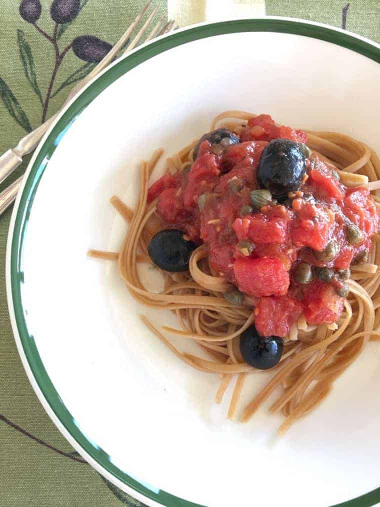 Pasta Puttanesca | This is an easy heat-and-eat dinner. It’s loaded with the delicious flavors of tomatoes, olives, capers and anchovies. Everyone likes it. At least when I serve it, no complaints. Ever! www.LiveBest.info