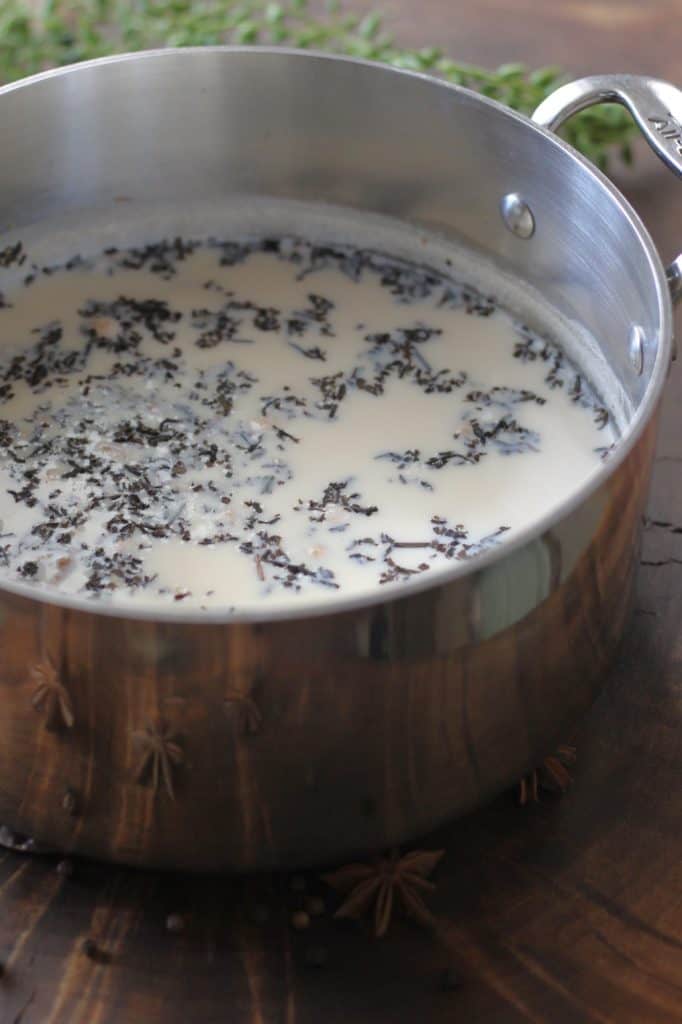 pan with milk, water, tea and spices