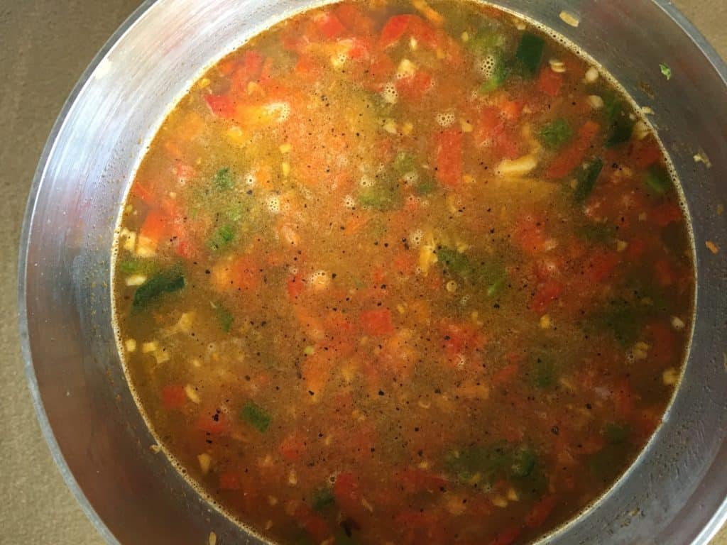 Gallo Pinto broth on pan