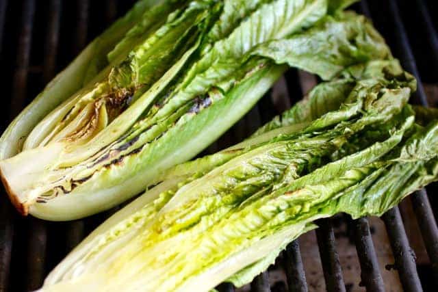 Romaine halves on grill