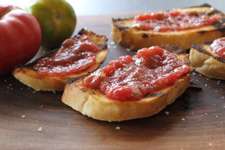 Grilled Tomato Bread | My favorite souvenir from New Jersey! Chewy warm garlic toast with smashed fresh tomato and salt. Yep! www.LiveBest.info