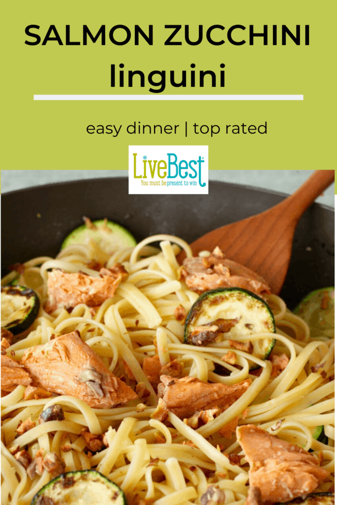 salmon linguini with zucchini in pan