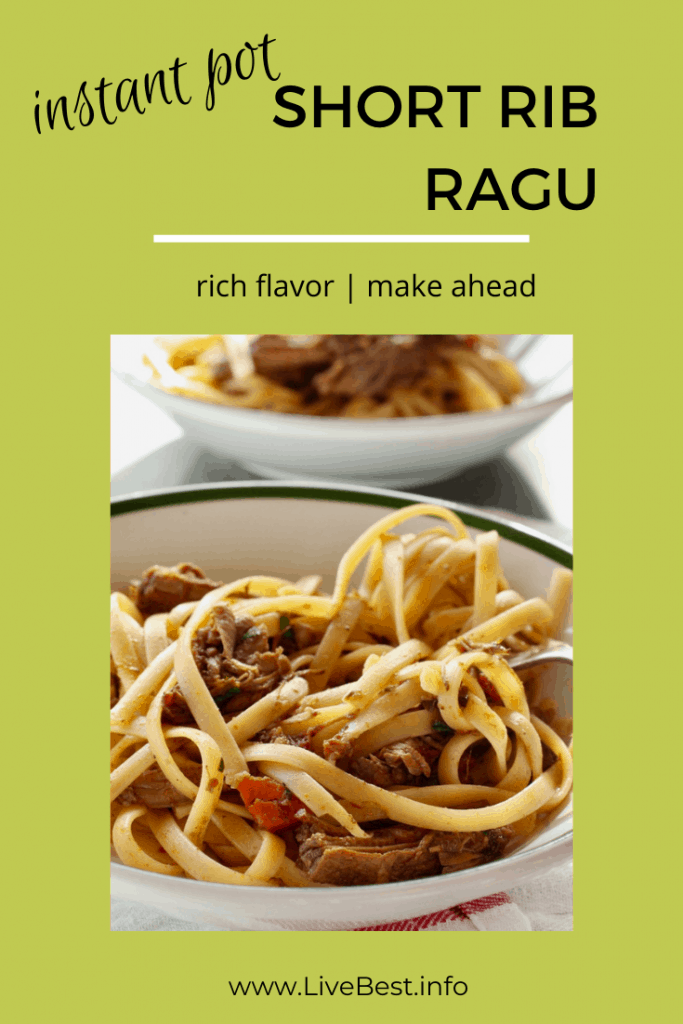 two bowls of pasta with short rib ragu mixed in