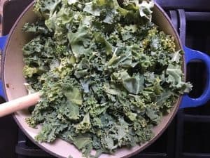 fresh kale in Dutch oven