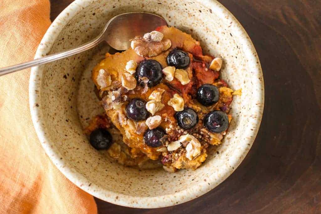 Pumpkin Spice Baked Oatmeal bowl with spoon