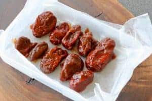 chipotle peppers on waxed paper