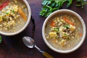 2 Corn Jalapeno Soup bowls with spoon
