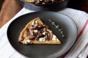 image slice of mushroom goat cheese dutch baby