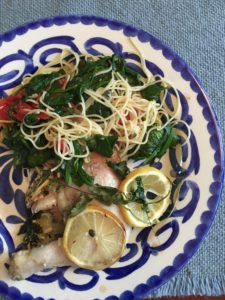 Baked lemon chicken with tomato spinach pasta