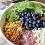 blueberry, corn, feta, pecans, onion, quinoa in a bowl