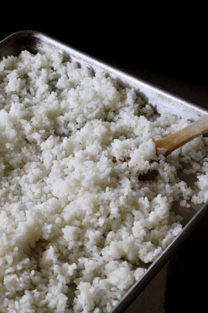 sushi rice on baking sheet