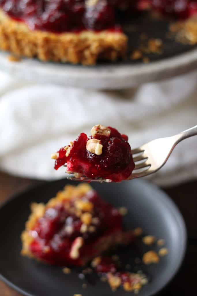 close up of fork with Orange Yogurt Cranberry Tart