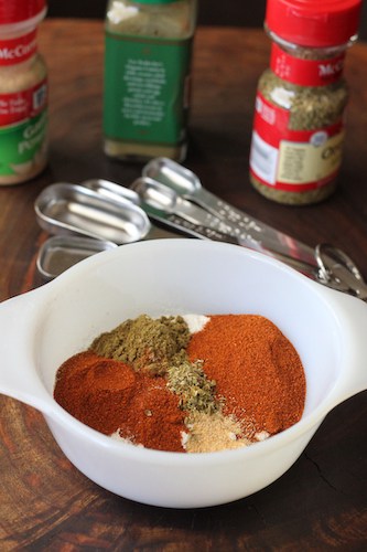 spices in a bowl for homemade enchilada sauce