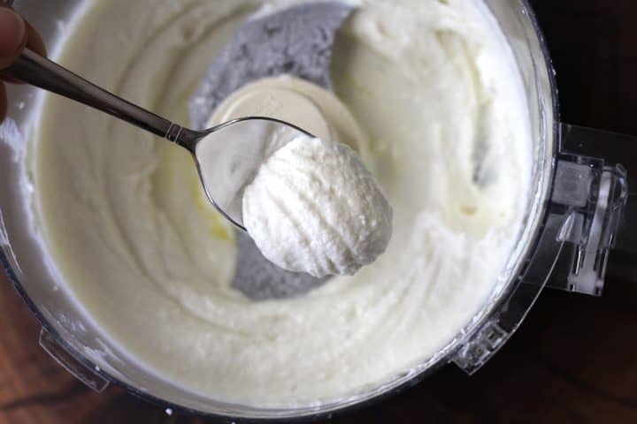 a spoonful on whipped feta from the food processor 