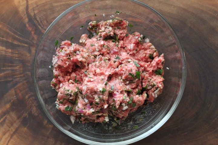 bowl of ground beef, onion and seasonings