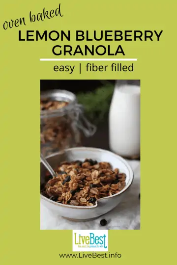 bowl of lemon blueberry granola with milk in background