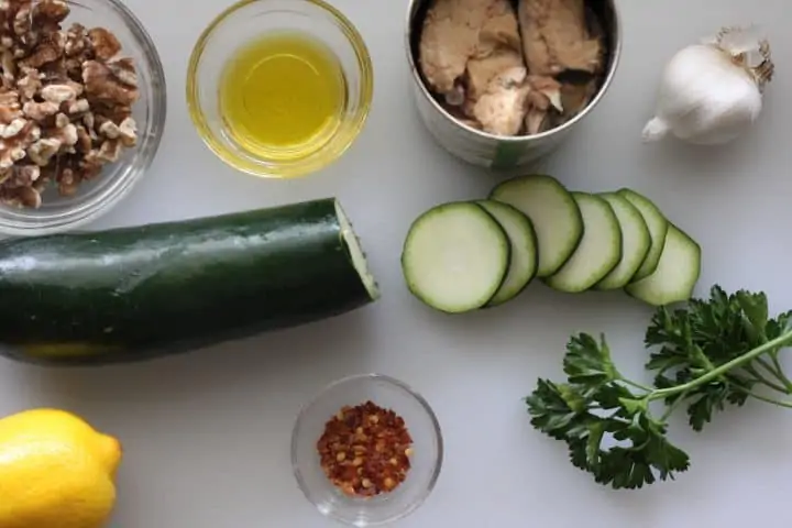 walnuts, olive oil, canned salmon, zucchini, garlic, parsley, lemon, red pepper flakes
