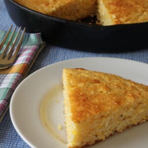 wedge of cornbread on a plate