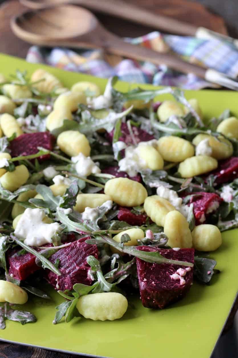 platter of beets, feta, arugula and gnocchi